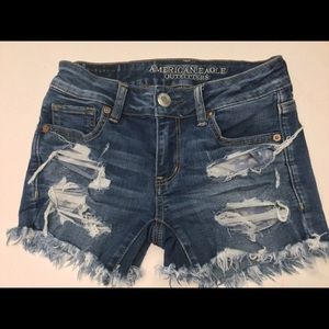 SOLD AE dark wash super stretch midi shorts
